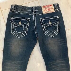 True Religion Women's Blue Jeans with bold white stitching.  EUC!
